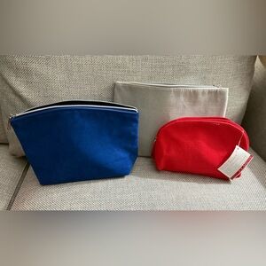 Bundle of 3 cosmetic bags - 2 Lancôme & 1 Clarins